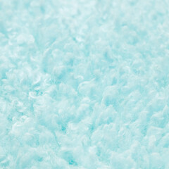 Wall Mural - Texture of light blue artificial fur close up. Home decor and comfort concept.