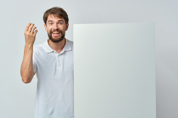 Wall Mural - emotional man in a white t-shirt mocap poster discount advertising isolated background