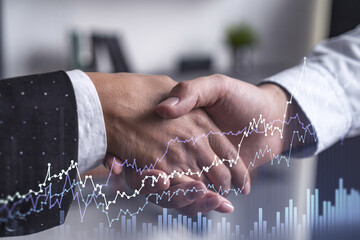 Wall Mural - A handshake as a symbol of successful transaction on brokerage services at international investment bank. Capital market, stock trading. Financial hologram chart. Women in business.