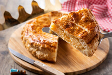 Galette Des Rois On Wooden Table. Traditional Epiphany Cake In France	