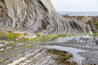 Stone furrows in the Sakoneta beach at low tide. Taken in Sakoneta beach, Basque Country, in July 2021