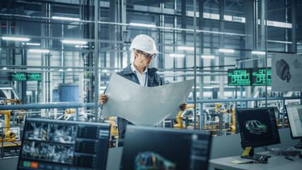 Poster - Engineer in Uniform and Hard Hat Looking at a Technical Blueprint at Work in an Office at Car Assembly Plant. Industrial Specialist Working on Vehicle Parts in Technological Development Facility.
