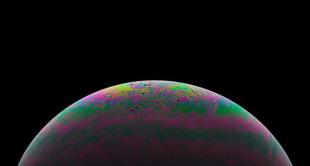 Wall Mural - Virtual reality space with abstract multicolor psychedelic planet. Closeup Soap bubble like an alien planet on black background.