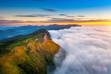 Phu Chi Fa And Mist At Sunrise In Chiang Rai Province,Thailand.