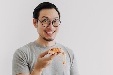 Funny face nerd Asian man has cheesy pizza isolated on white background.