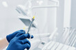 © dimik_777 - a dentist holds a dental syringe in a dental clinic