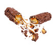 Waffle chocolate bar crushed in the air into two halves on a white background