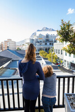 Children On Balcony Looking At Capetown, South Africa