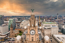 Aerial Close Up Of The Tower Of The Royal Liver Building In Liverpool, UK During Beautiful Sunset.