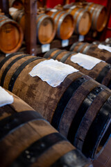 Wall Mural - Traditional production and aging in wooden barrels of Italian Balsamic grapes vinegar dressing in Modena, Italy