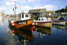 Fishing Boats In The Harbour Of Mevagissey Cornwall