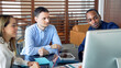 © metamorworks - Group of multi racial people meeting in the office. Global business. Video conference. Web meeting.