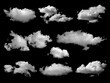 Beautiful white clouds elements set, isolated on black background.