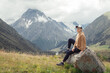© Mikhail - Girl hike in the mountains.