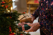 © Johnér - Woman's hands holding Christmas presents