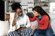 © Srdjan - Young woman felt a sudden pain and her friend try to consoling her before she call the doctor. Two females one is sick and other comforts her before they go to the hospital. Female health issues