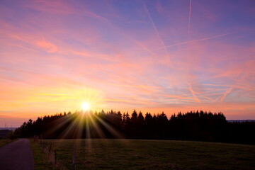 Wall Mural - pink sunset sky. in the evening sky with sun.