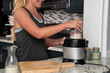 © Stacy Howell - Woman making smoothie