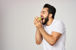 © VICHIZH - bearded man in white t-shirt apple health proper nutrition
