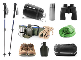 set with different camping equipment on white background