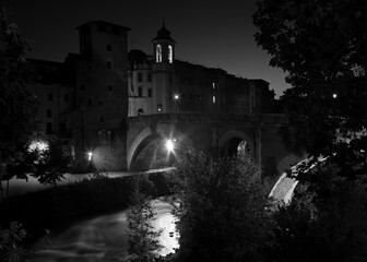 Wall Mural - Rome - The Isola Tiberiana - Tiberian Island at dusk.