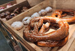 Pretzels and bagles in the bakery showcase. Atmospheric cafe background