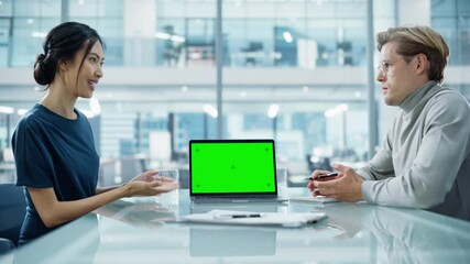 Poster - Multiethnic Diverse Office Conference Room Meeting: Team of Two Creative Entrepreneurs Talk, Discuss Growth Strategy, Use Laptop with Green Screen Mock Up Display.