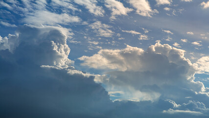 Wall Mural - Wonderful cumulus clouds sky with sun light at summer. Beautiful cloudscape