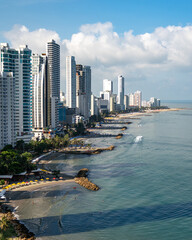 coast line of cartagena colombia with boats, beaches, and buildings