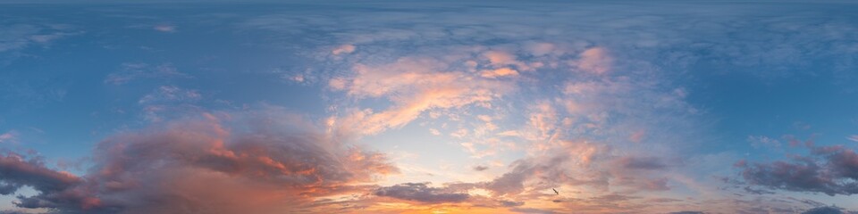 Dark blue sunset sky panorama with Cirrus clouds. Seamless hdr pano in spherical equirectangular format. Complete zenith for 3D visualization, game and sky replacement for aerial drone 360 panoramas.