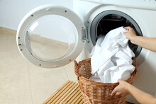Concept Of Housework With Washing Machine Against White Wall