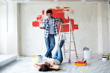 Young couple renovating their house