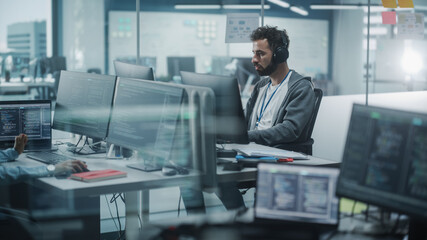 Aufkleber - Diverse Office: White IT Programmer Working on Computer. Male Specialist Creating Innovative Software. Engineer Developing App, Program, Video Game. Wearing Headphones Listening Podcast, Music
