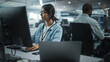 © Gorodenkoff - Diverse Office: Portrait of Talented Indian Girl IT Programmer Working on Desktop Computer in Friendly Multi-Ethnic Environment. Female Software Engineer Wearing Glasses Develop Inspirational App