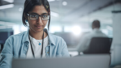 Poster - Diverse Office: Portrait of Beautiful Indian IT Programmer Working on Desktop Computer. Empowered Female Software Engineer Creating Innovative App, Program, Video Game in Friendly Environment
