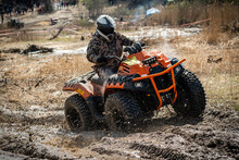 ATV Rider In Hard Dirt Track. Extreme Ride.