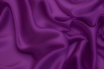 Wall Mural - Close-up texture of natural violet or purple fabric or cloth in same color. Fabric texture of natural cotton, silk or wool, or linen textile material. Violet or purple canvas background pattern.