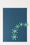 Fototapeta Sypialnia - blue snowflakes on paper