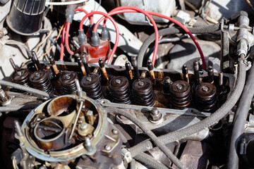 Wall Mural - Disassembled carburetor motor. Cylinder head without rocker shaft installed on engine. DIY repair. valve setting