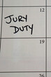 © MKPhoto - Handwritten calendar reminder for jury duty