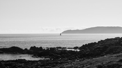 Wall Mural - Black and white panorama of the Finisterre coast in the Atlantic ocean. Finisterre Cape , Costa da Morte, Galicia, Spain.