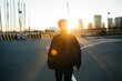 © Jordi Salas - Portrait of a young latin american male walking on a urban scape