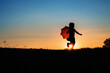 A Sunset Silhouette with a Girl Child Kid Running with a Red Umbrella Blue Orange Gorgeous Sun Bright Creative Shot Photo Image Photography Get Outside Childhood Unplugged Fresh Air Exercise Run