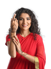 Wall Mural - Beautiful Indian woman with henna tattoo on white background