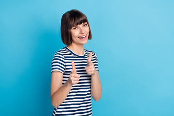 Wall Mural - Photo of funny brunette millennial lady point you wear striped t-shirt isolated on blue background