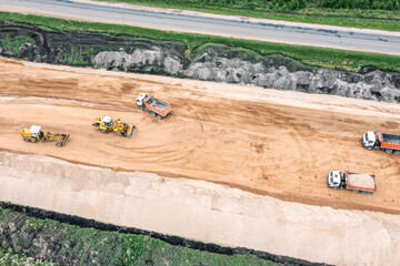 aerial view of road construction site during earthworks progress. drone photography.