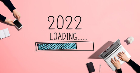 Poster - Loading new year 2022 with people working together with laptop and phone