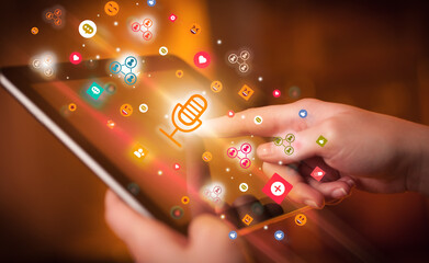 Aufkleber - Close-up of a hand using tablet with social media icons
