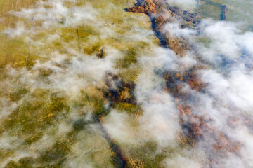 Wall Mural - Drone photo of foggy sunrise over autumn hills