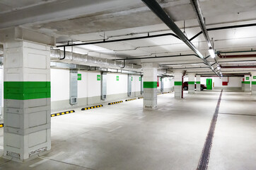 Wall Mural - Underground car parking, perspective view of parking garage